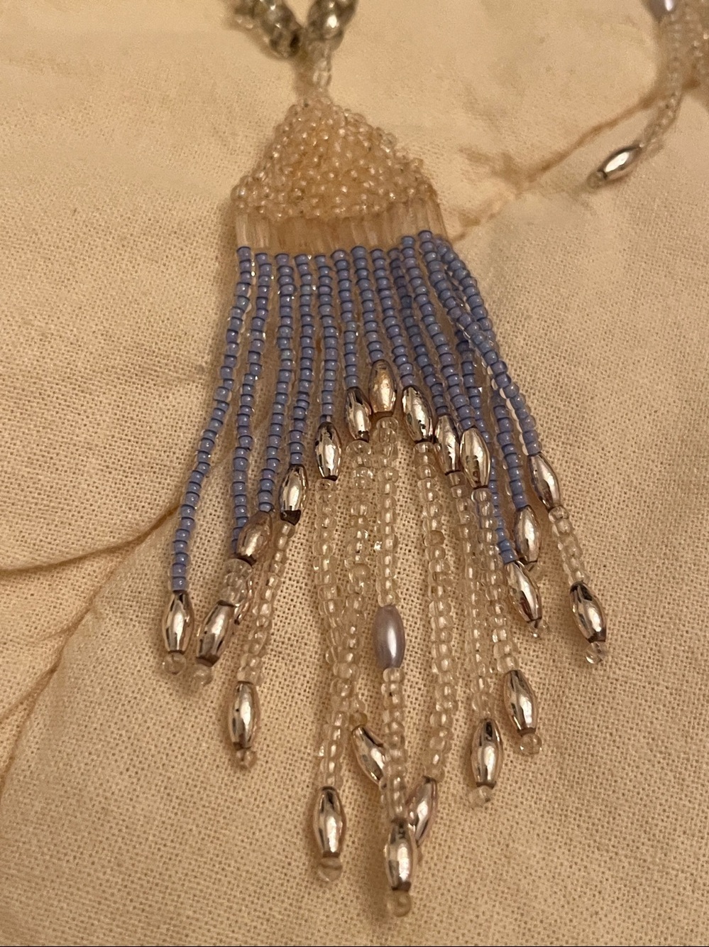 Silver Chain Necklace with Blue Tassel Pendant with matching earrings.